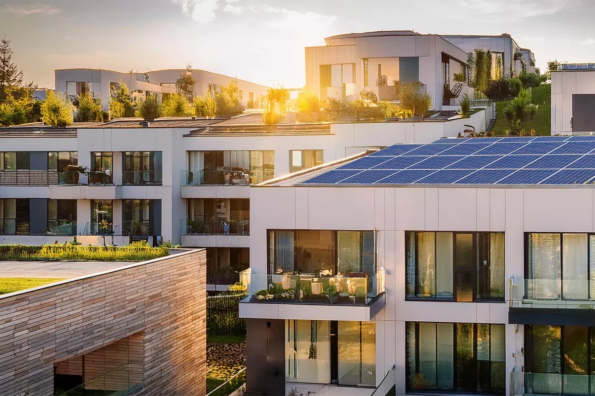 Multi family house with pv-system on the roof.
