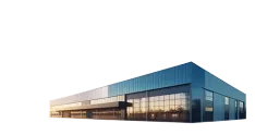 Modern industrial building with glass facade and metal cladding.